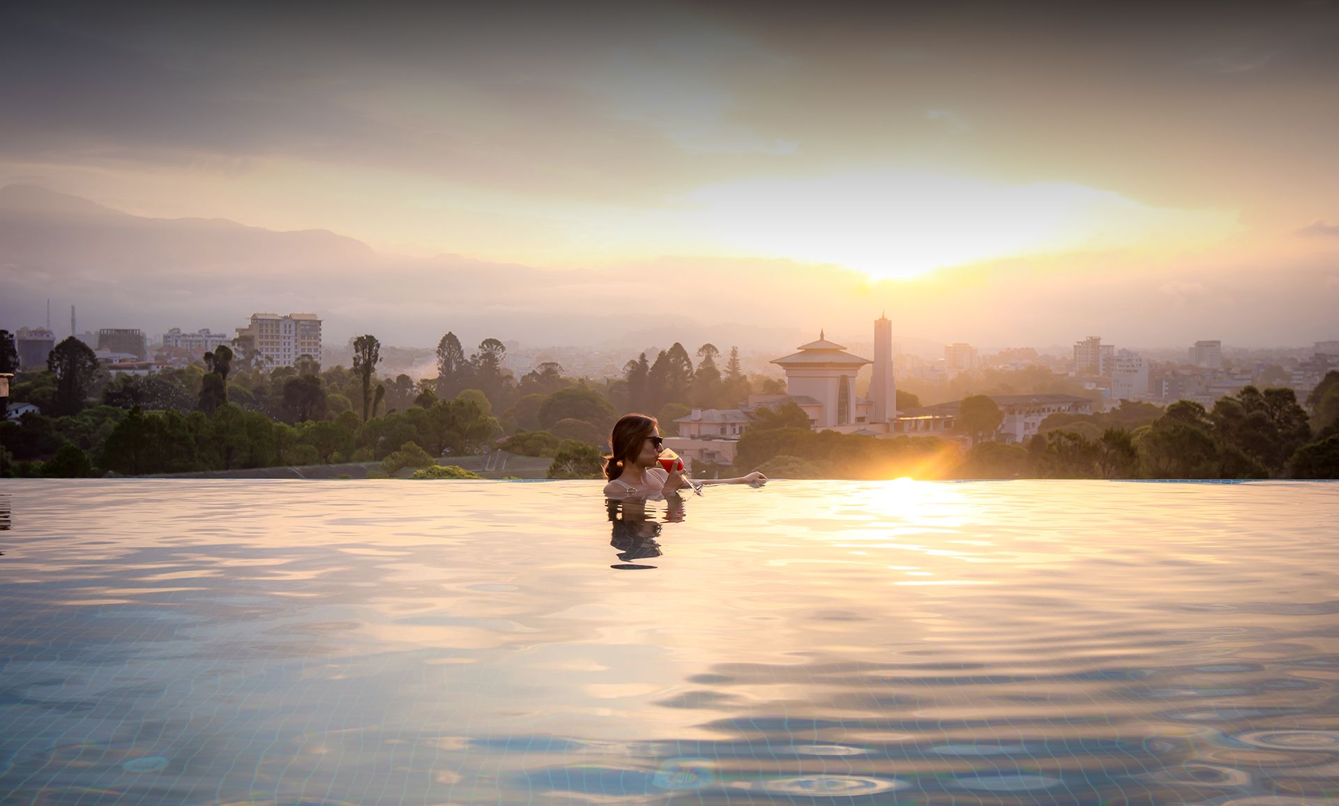 Sunset view from infinity swimming pool at Hotel Barahi Kathmandu